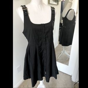 Black button up mini dress with buckle straps